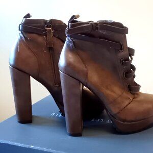 Daya by Zendaya    from a closed collection, size 7   brown leather man made.